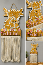 Load image into Gallery viewer, Personalized Highland cow hair bow holder with custom name, floral accents and macrame bow storage
